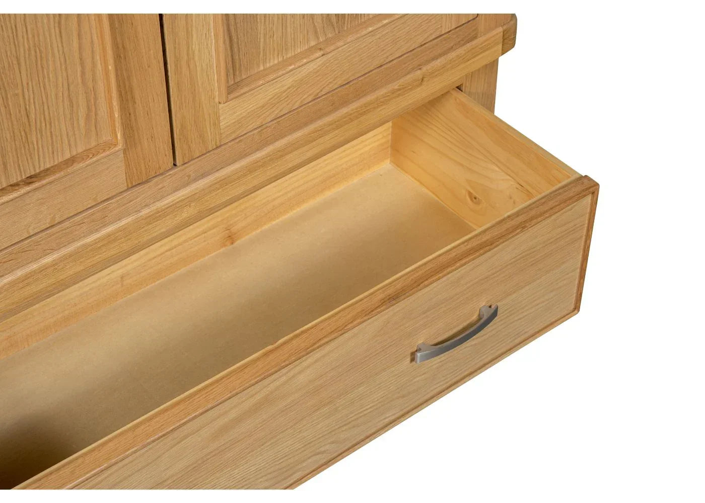 Closeup of oak 2-door wardrobe drawer with metal handle, open and empty