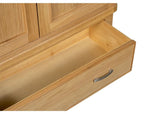 Closeup of oak 2-door wardrobe drawer with metal handle, open and empty