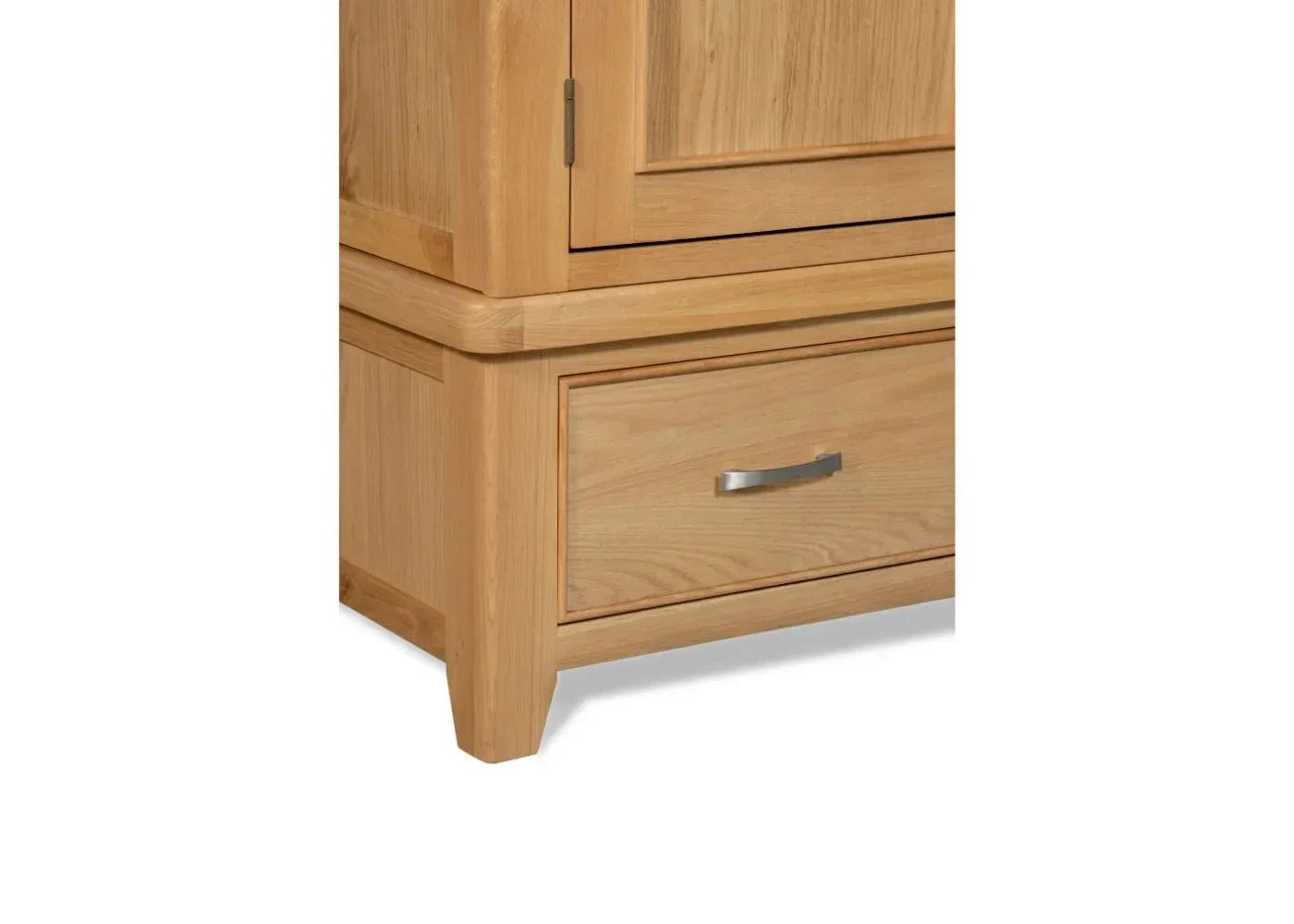Oak 2-door wardrobe lower corner showing drawer with metal handle and wood grain detail