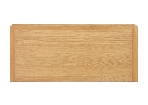 Sligo 6 drawer chest back panel in natural oak wood finish, straight-on rear view