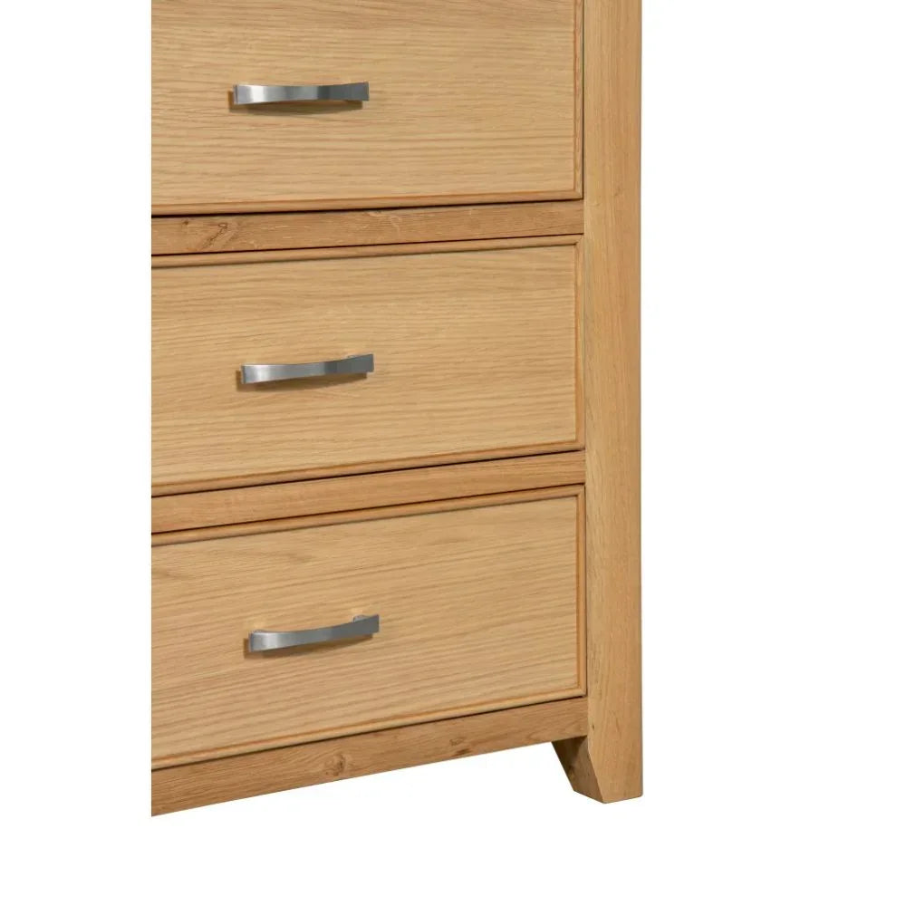 Oak chest of drawers lower section with three metal handles and natural wood grain finish