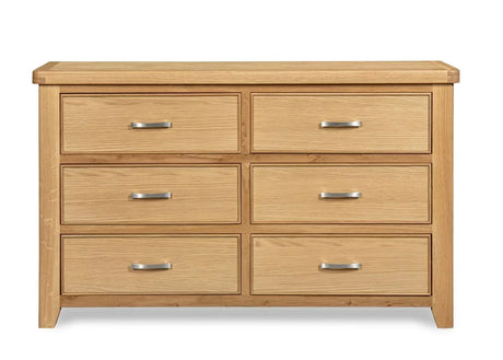 Oak 6 drawer chest with silver handles, wood grain finish, shown from the front