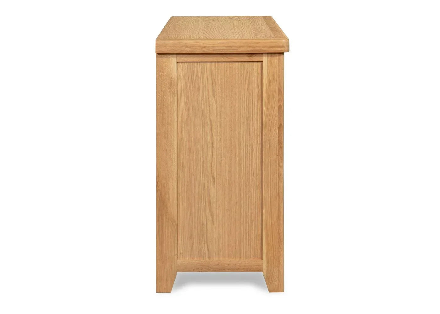 Side view of light oak 6 drawer chest showing wood grain and panel detail