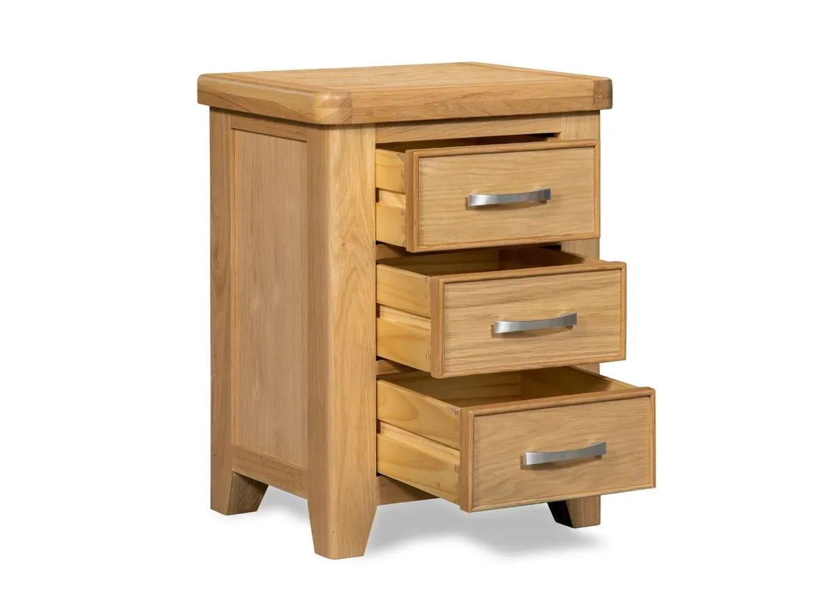 Oak bedside table with three drawers open, featuring metal handles and wood grain finish