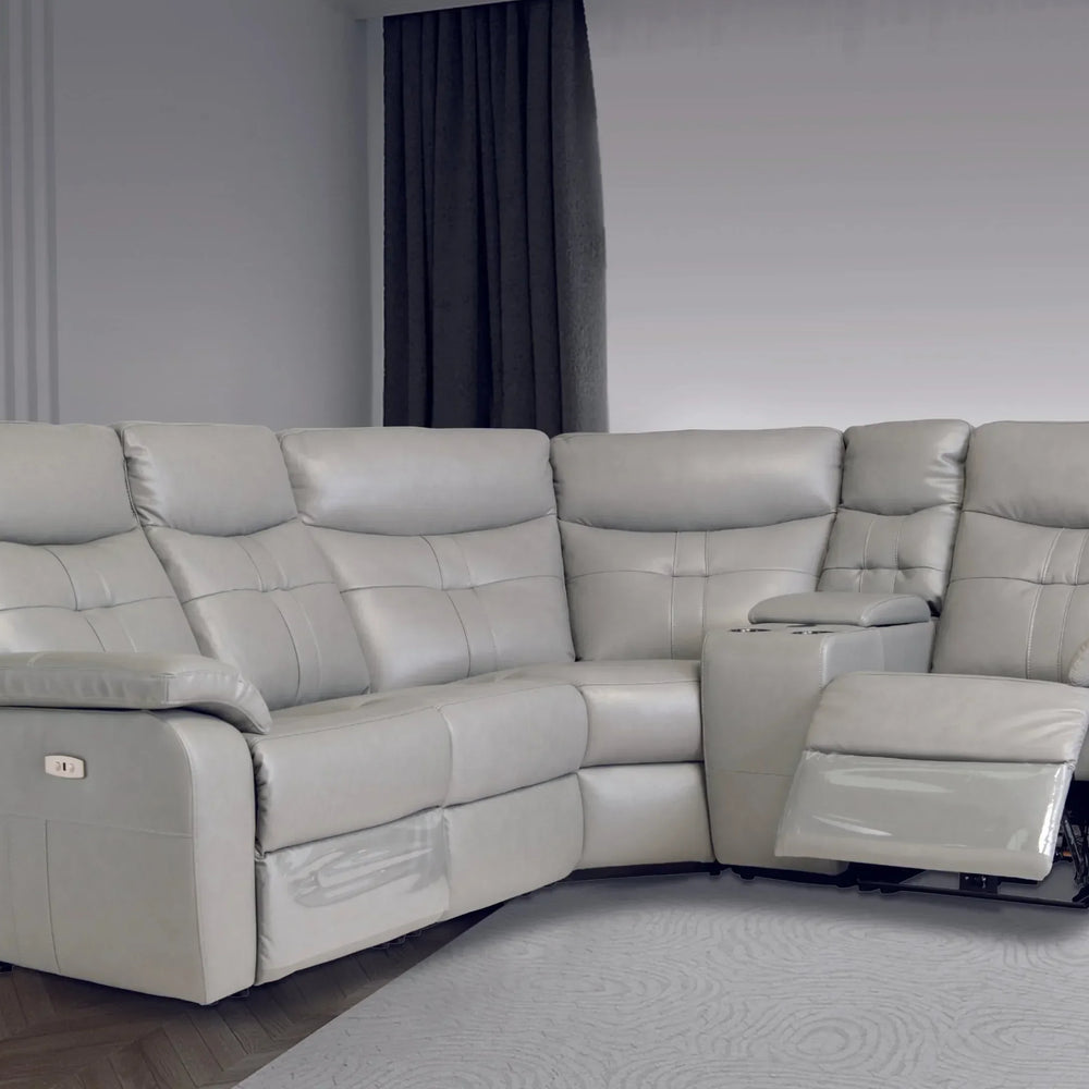 Grey leather corner sofa with reclining seat and cup holders in modern living room