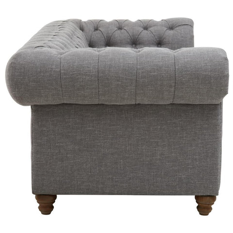 Three-seat sofa upholstered in grey linen with a tufted backrest and rounded armrest, featuring wooden legs for support. The design showcases a modern yet classic aesthetic suitable for various living spaces