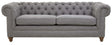 Three-seat sofa upholstered in grey linen with a tufted backrest and rolled arms, featuring wooden legs in a light finish