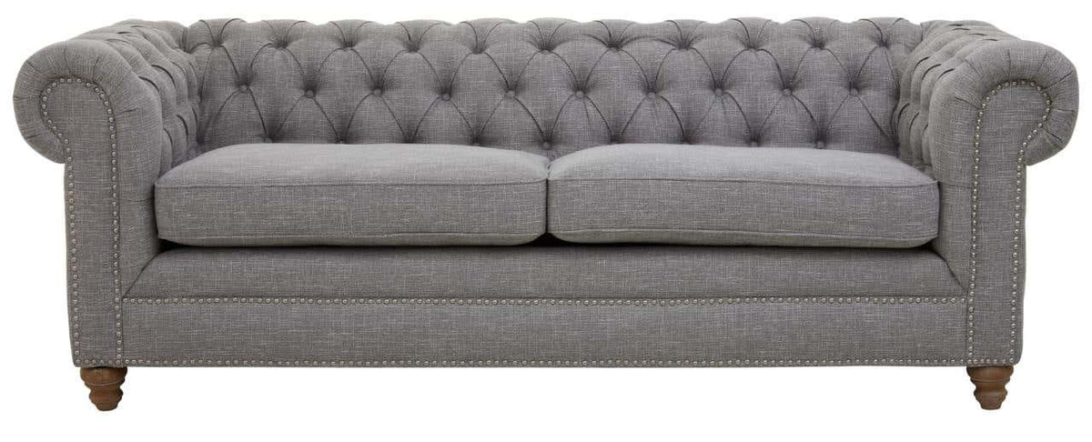 Three-seat sofa upholstered in grey linen with a tufted backrest and rolled arms, featuring wooden legs in a light finish