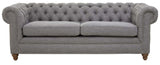Three-seat sofa upholstered in grey linen with a tufted backrest and rolled arms, featuring wooden legs in a light finish