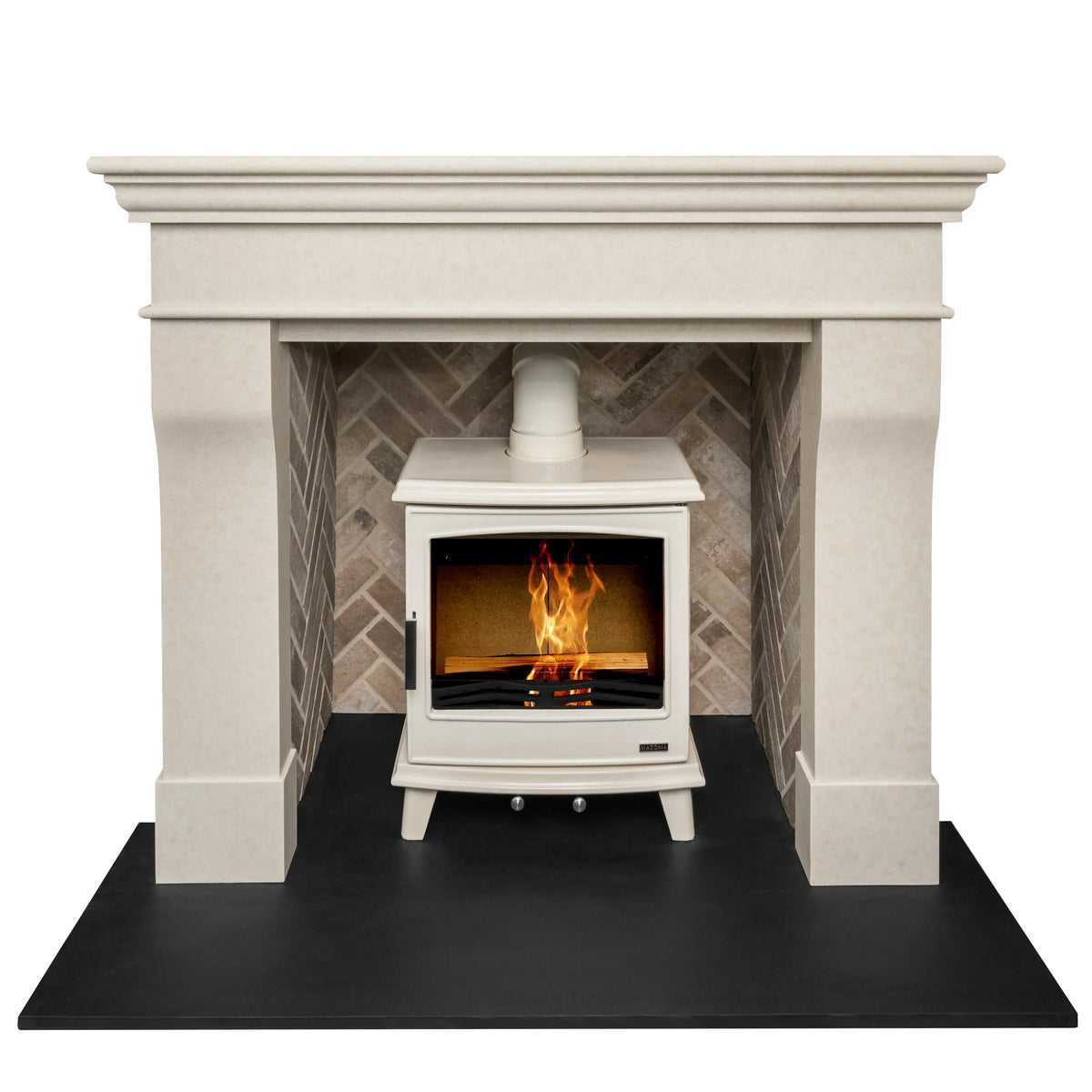 Cream stone fireplace with herringbone brick interior and freestanding wood stove burning wood