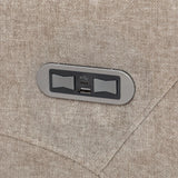 Close-up of beige fabric sofa arm with built-in USB and USB-C charging ports